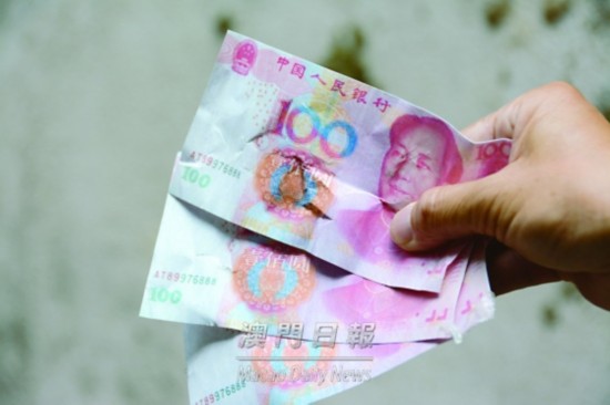 澳門驚現“人民幣牆”滿牆“百元大鈔”誘人（組圖）