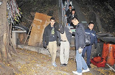 港竊賊鑿穿大廈牆壁僅偷300元藏匿山洞遭圍捕