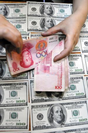 人民幣上半年跌逾2.5% 下半年破6壓力大 人民幣上半年跌逾2.5% 下半年破6壓力大