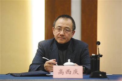 高西慶，全國人大代表，清華大學法學院教授。高西慶談“萬寶之爭”時表示，從證券法的規定來說，寶能買入萬科股票時並沒有違法。新京報記者 薛珺攝