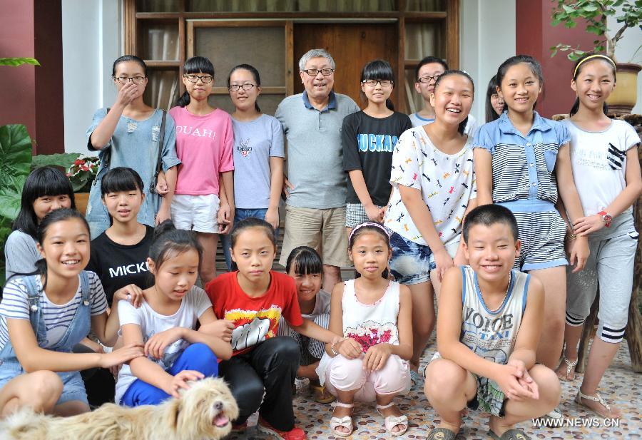 A photo taken on July 16, 2015 shows Professor Lin Nien-sheng, a Taiwan compatriot and students of his free country school in Houjiao Village of Putian City, southeast China's Fujian Province, July 16, 2015. A photo taken on July 16, 2015 shows Professor Lin Nien-sheng, a Taiwan compatriot and students of his free country school in Houjiao Village of Putian City, southeast China's Fujian Province, July 16, 2015.